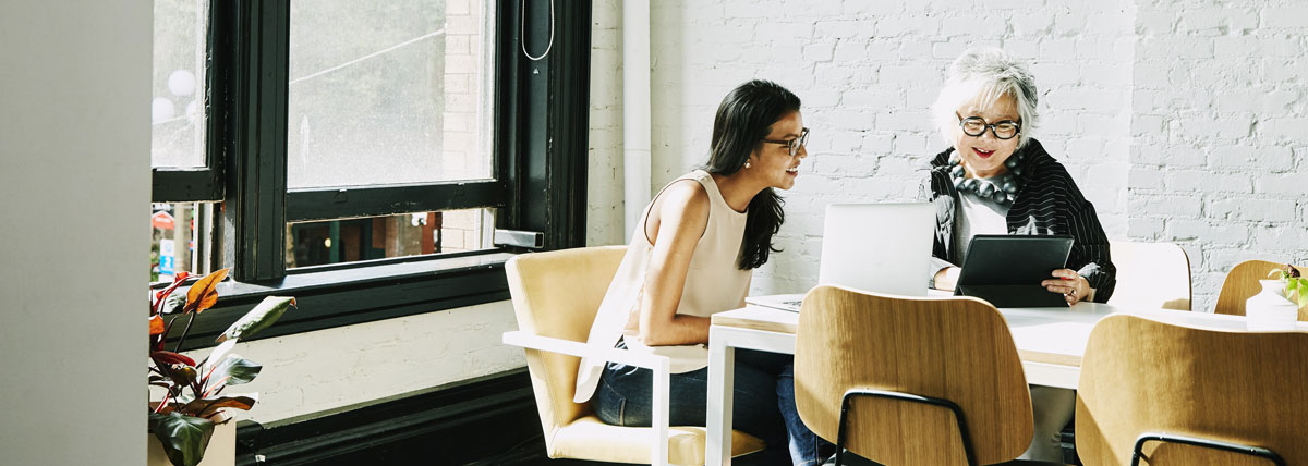 women collaborating at a table