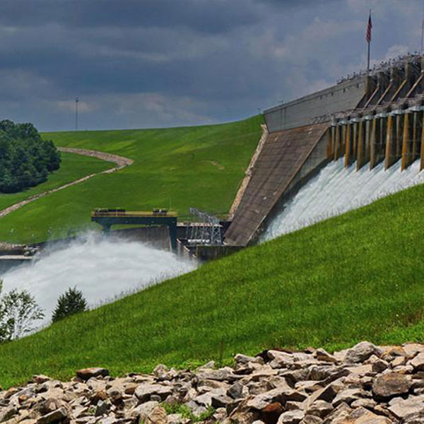 water flowing at dam